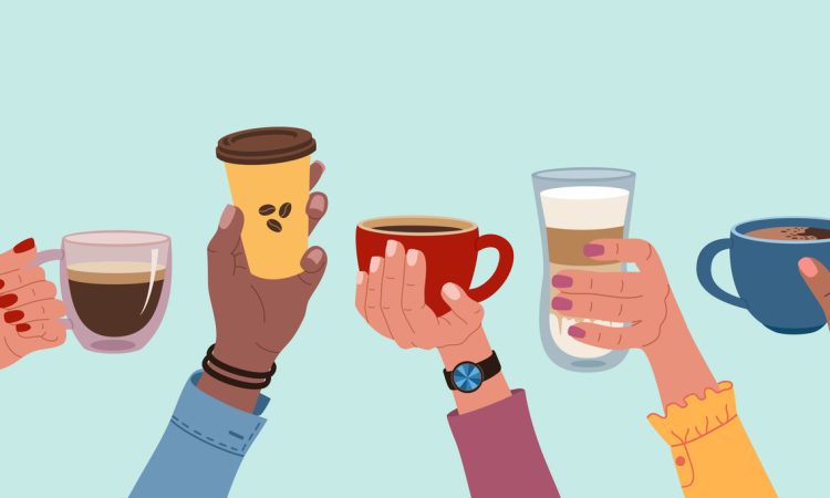 Diverse hands holding up cups of coffee