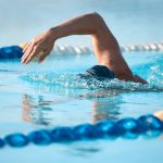 Swimmer doing laps in pool