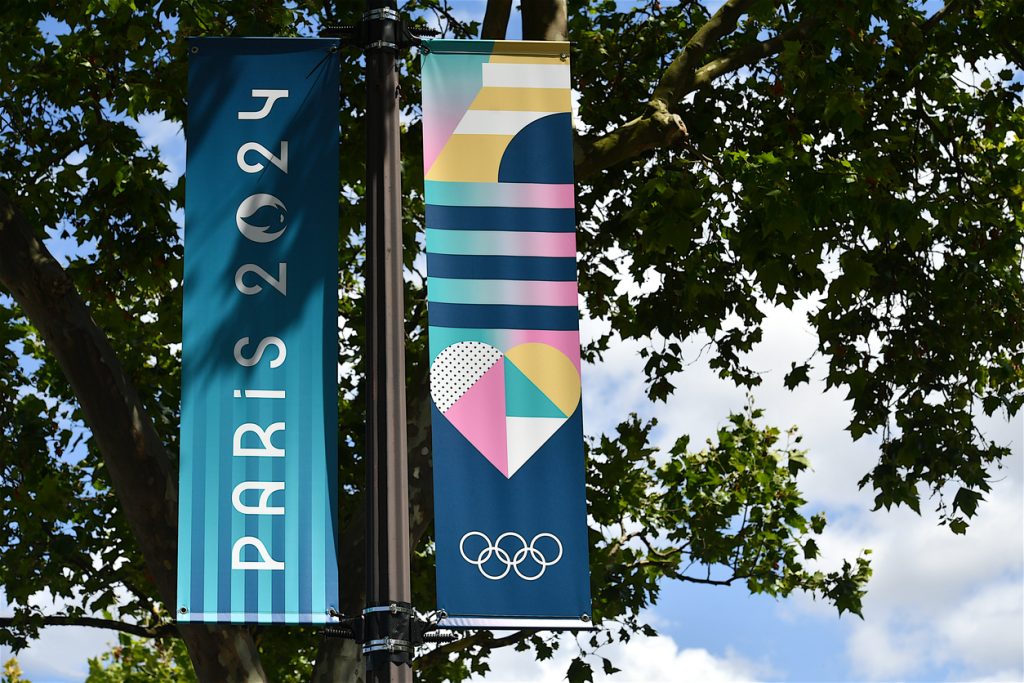 Decorative banner for the Paris summer Olympics on a street of the French capital.