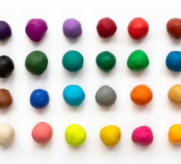 Colourful clay balls lined up in a grid