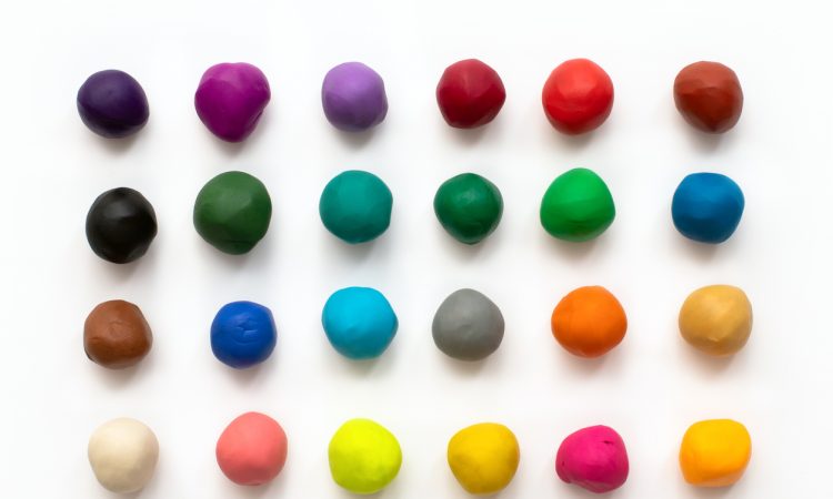 Colourful clay balls lined up in a grid