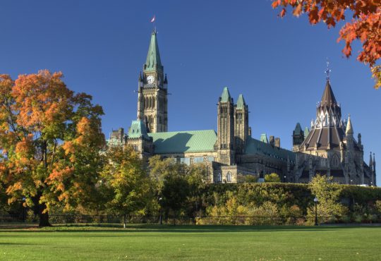 The Parliament Buildings viewed from Major's Hill Park during a clear Autumn day.