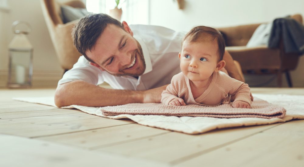 Dad with baby at home