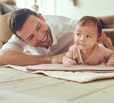 Dad with baby at home