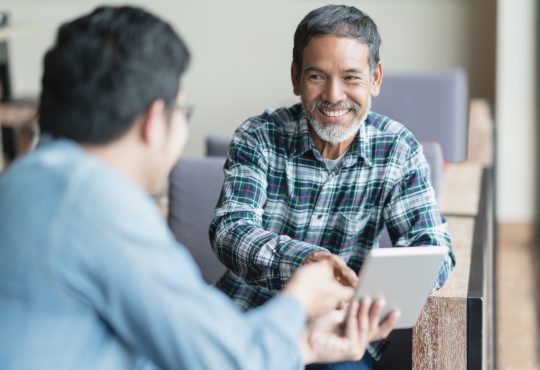 Two men having meeting