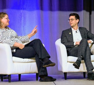 Tony Bonen and Tricia Williams speak on stage during a panel discussion at CERIC's Cannexus conference.