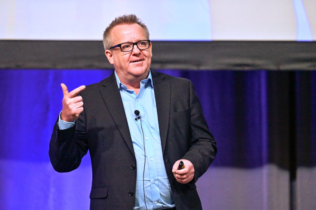 Dr. Kevin Glavin speaks on the main stage at Cannexus25.