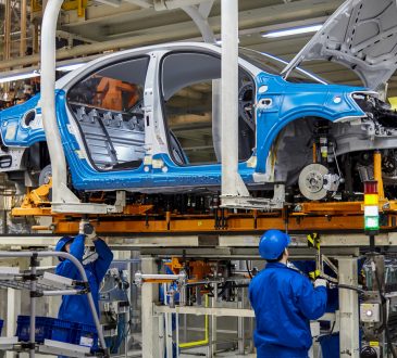 Car on assembly line in factory