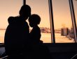Mother and her little son waiting for boarding in the airport.