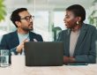 Man and woman talking in office