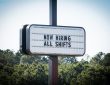 Business sign advertising job opportunities