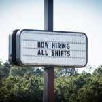 Business sign advertising job opportunities