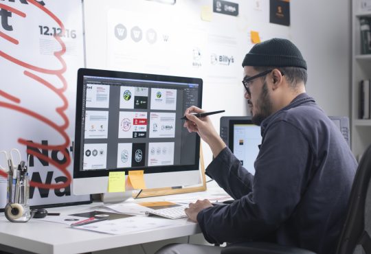 Graphic designer working on computer