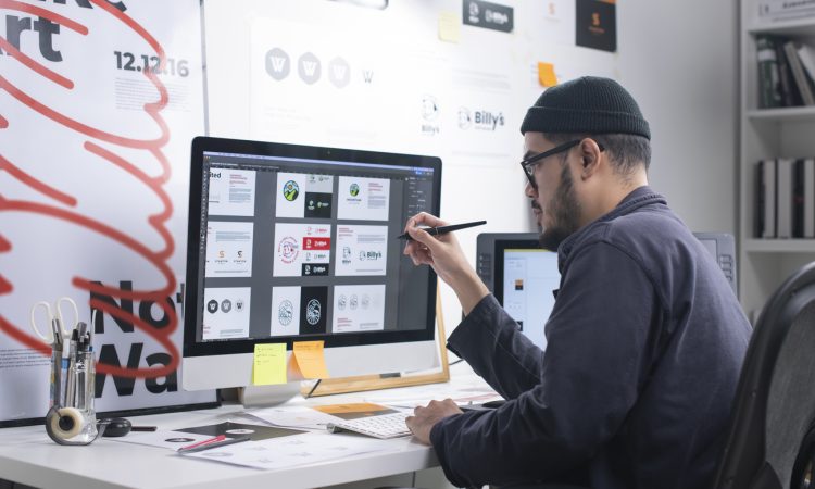 Graphic designer working on computer