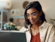 Woman reading on laptop
