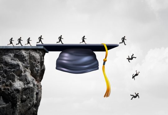 students falling from a cliff shaped as a graduation mortarboard