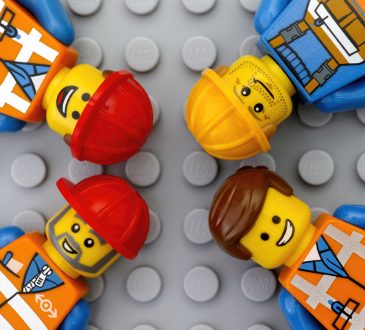 Four Lego workers minifigures