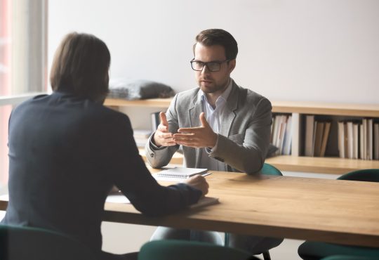 Serious businessmen discussing in an office