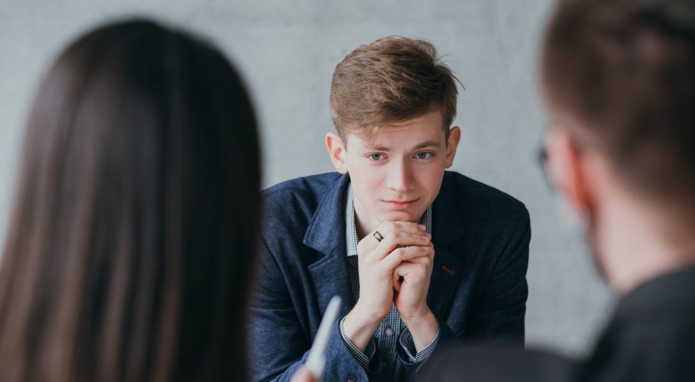 Stressful job interview. Professional career. Human resources. Young male applicant feeling nervous, needs to get the job.