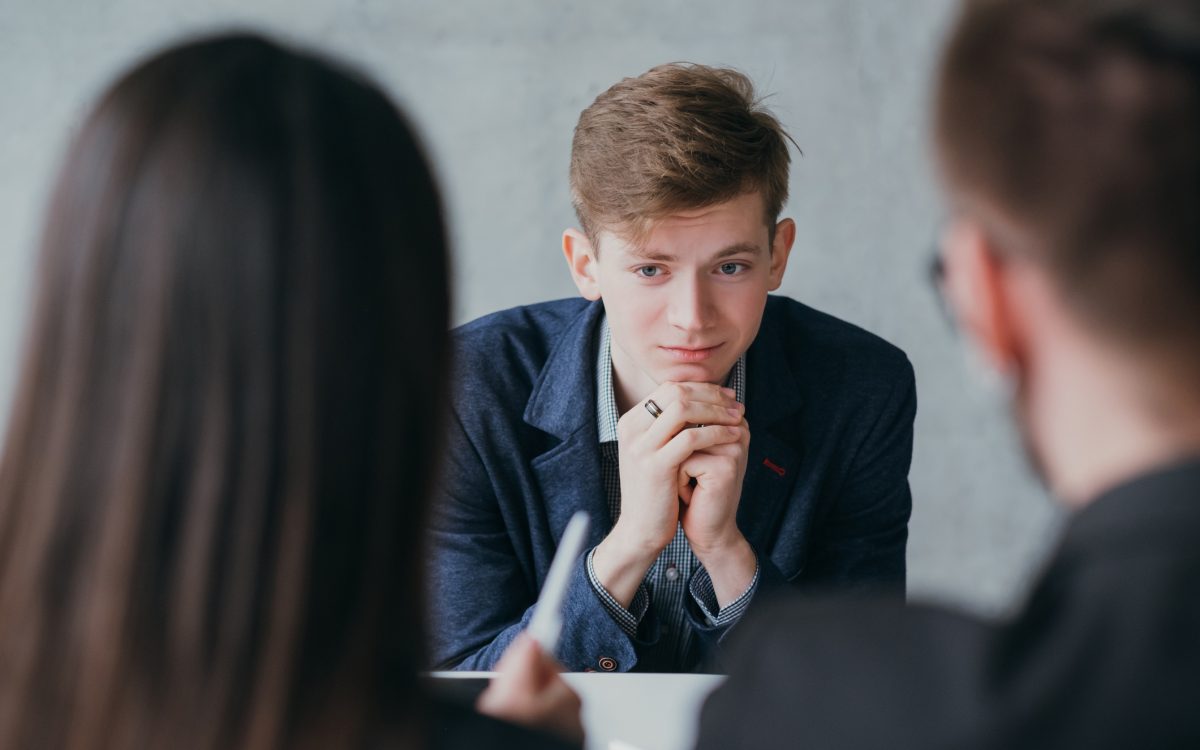 Stressful job interview. Professional career. Human resources. Young male applicant feeling nervous, needs to get the job.