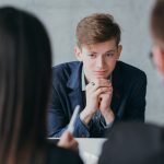 Stressful job interview. Professional career. Human resources. Young male applicant feeling nervous, needs to get the job.
