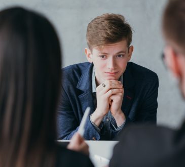 Stressful job interview. Professional career. Human resources. Young male applicant feeling nervous, needs to get the job.