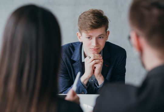 Stressful job interview. Professional career. Human resources. Young male applicant feeling nervous, needs to get the job.
