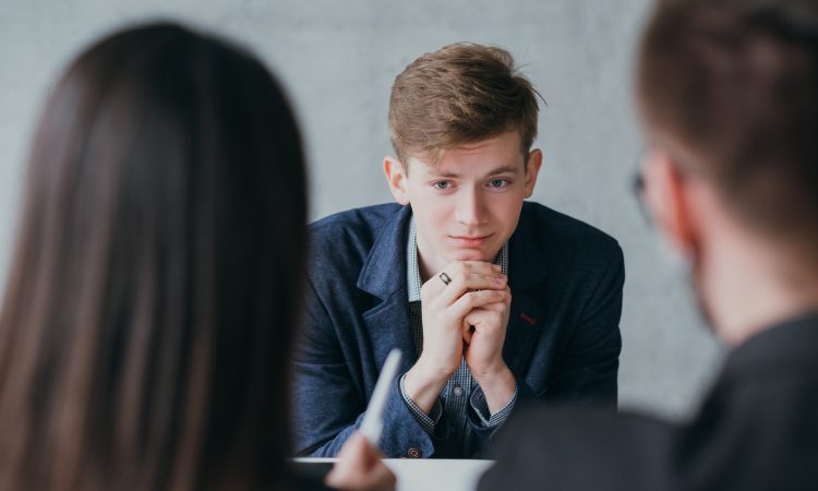 Stressful job interview. Professional career. Human resources. Young male applicant feeling nervous, needs to get the job.