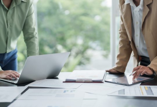 Business Professional Chartered Accountant Woman working with computer and calculator Sales Invoice Accounting