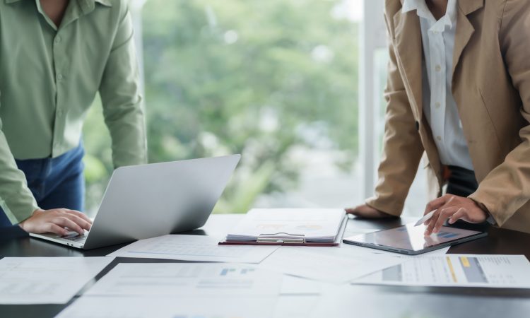 Business Professional Chartered Accountant Woman working with computer and calculator Sales Invoice Accounting