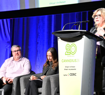 Dr. Tannis Goddard delivering a main stage speech at Cannexus26